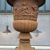 Large old cast iron planter on pedestal