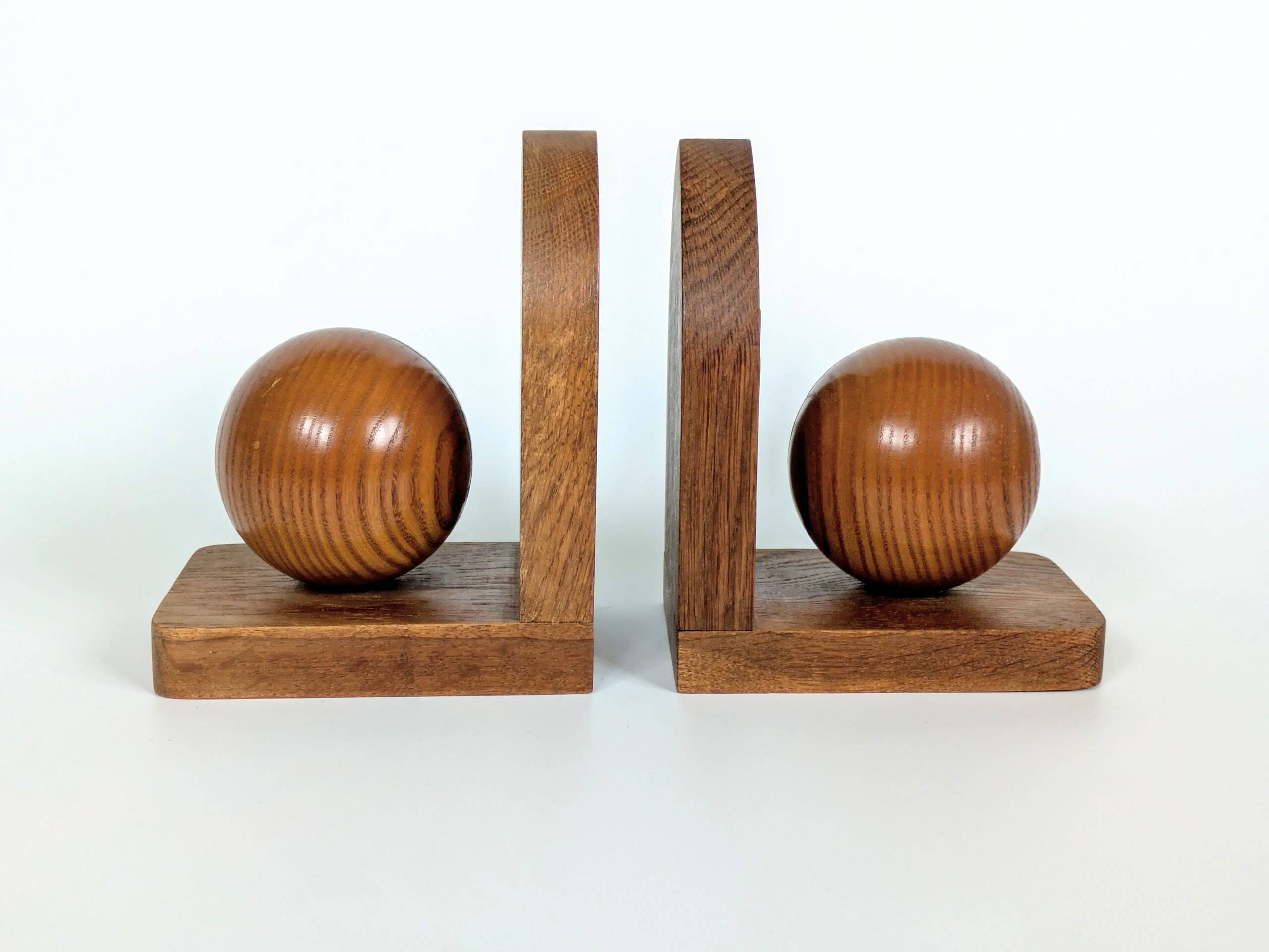 Pair of antique oak wood ball bookends