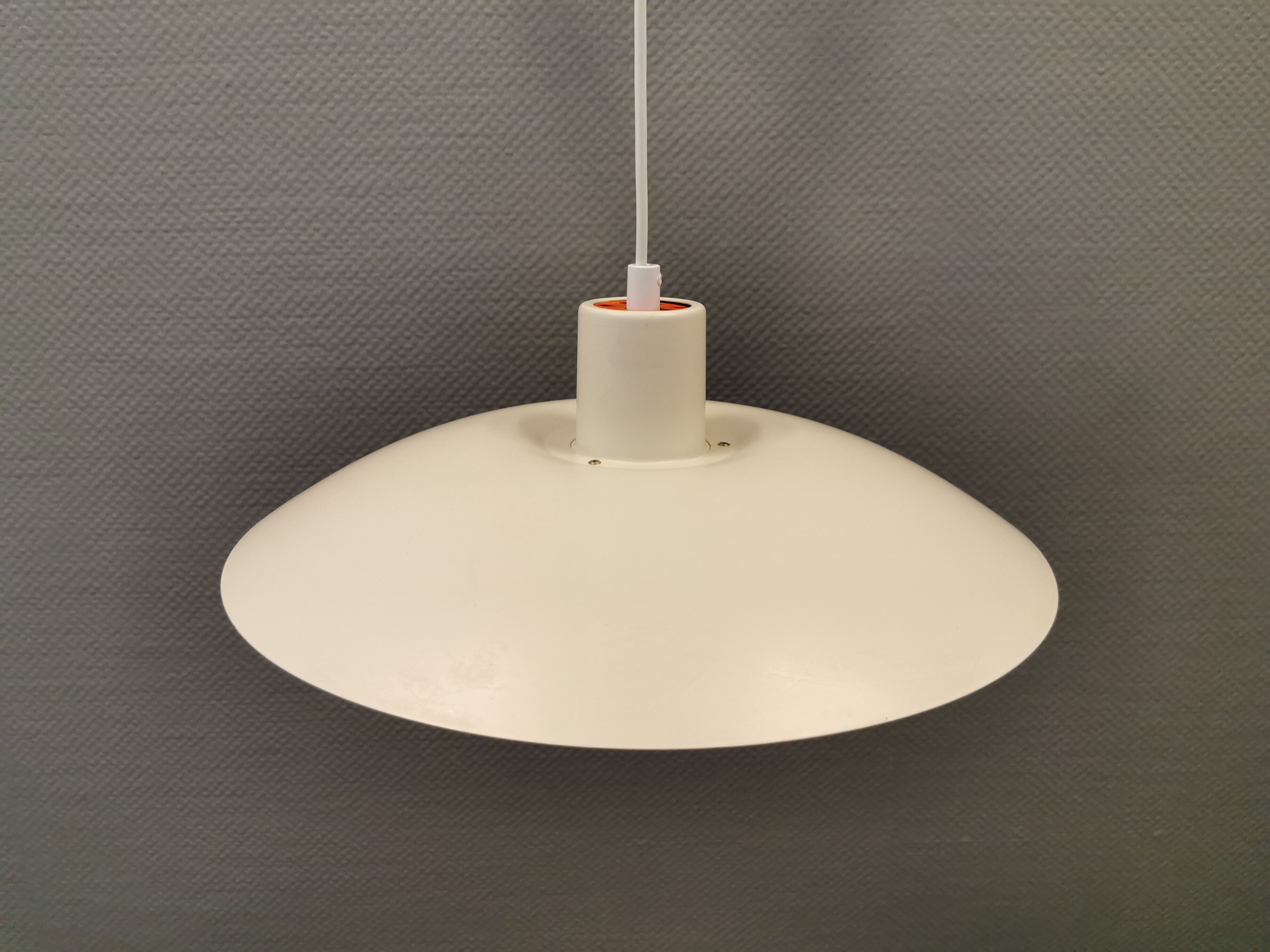 Older ph 4/3 hanging lamp, in white, with original orange suspension disk.