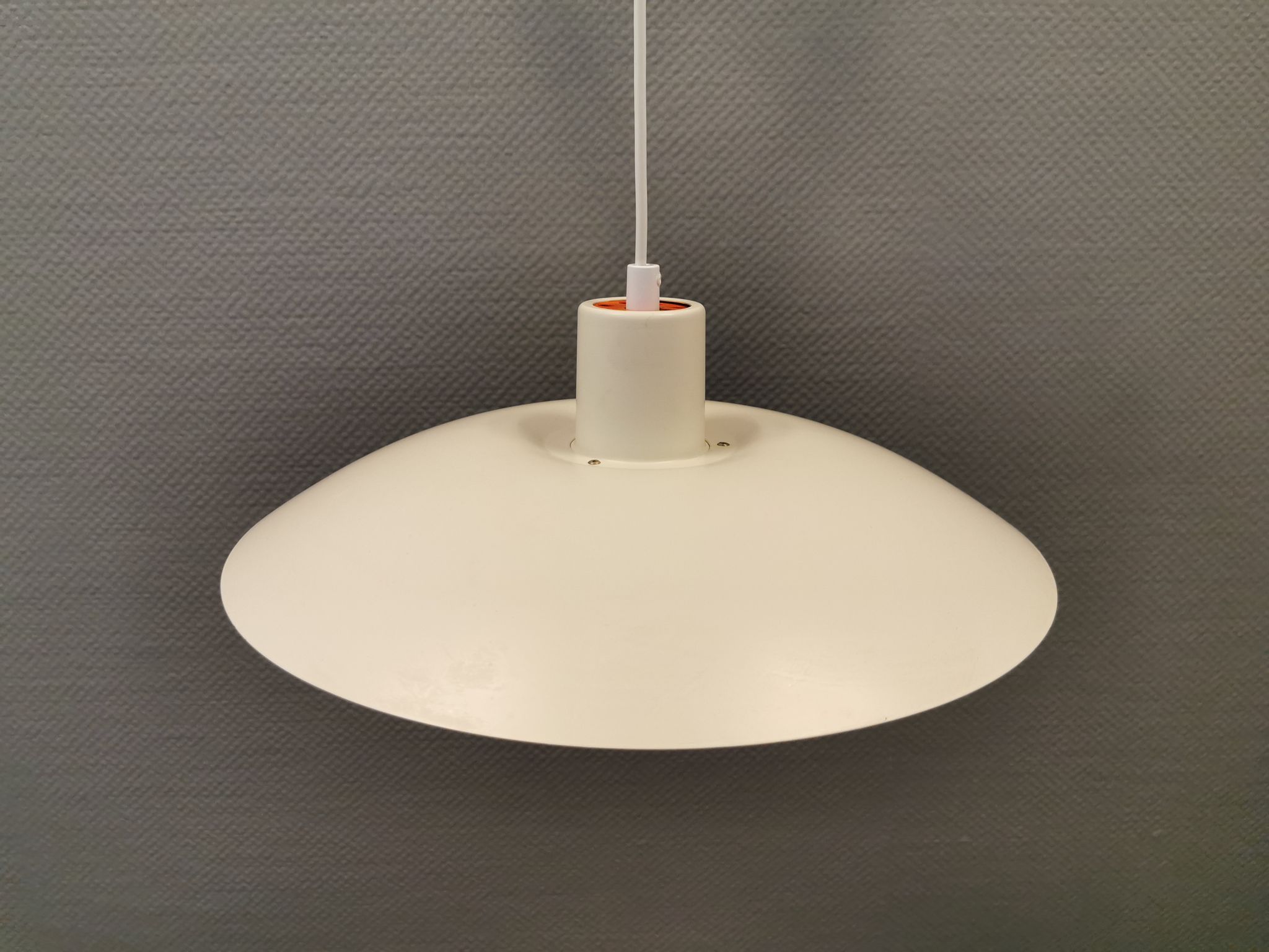 Older ph 4/3 hanging lamp, in white, with original orange suspension disk.