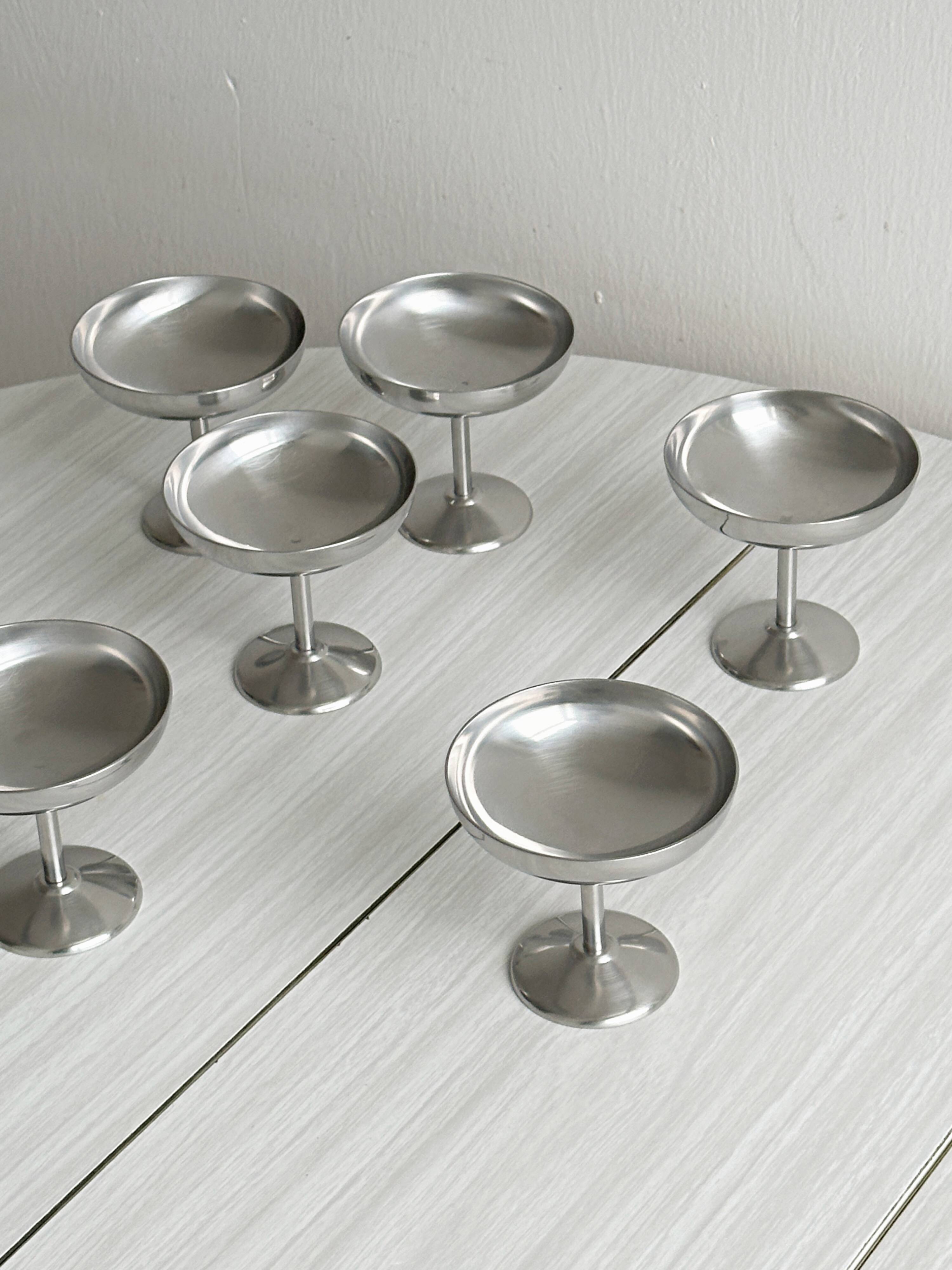 6 metal bowls in the style of Guy Degrenne