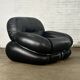 Okay armchair by Adriano Piazzesi in black leather with ottoman