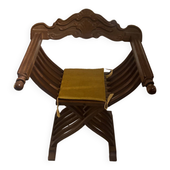 Curule wooden armchair