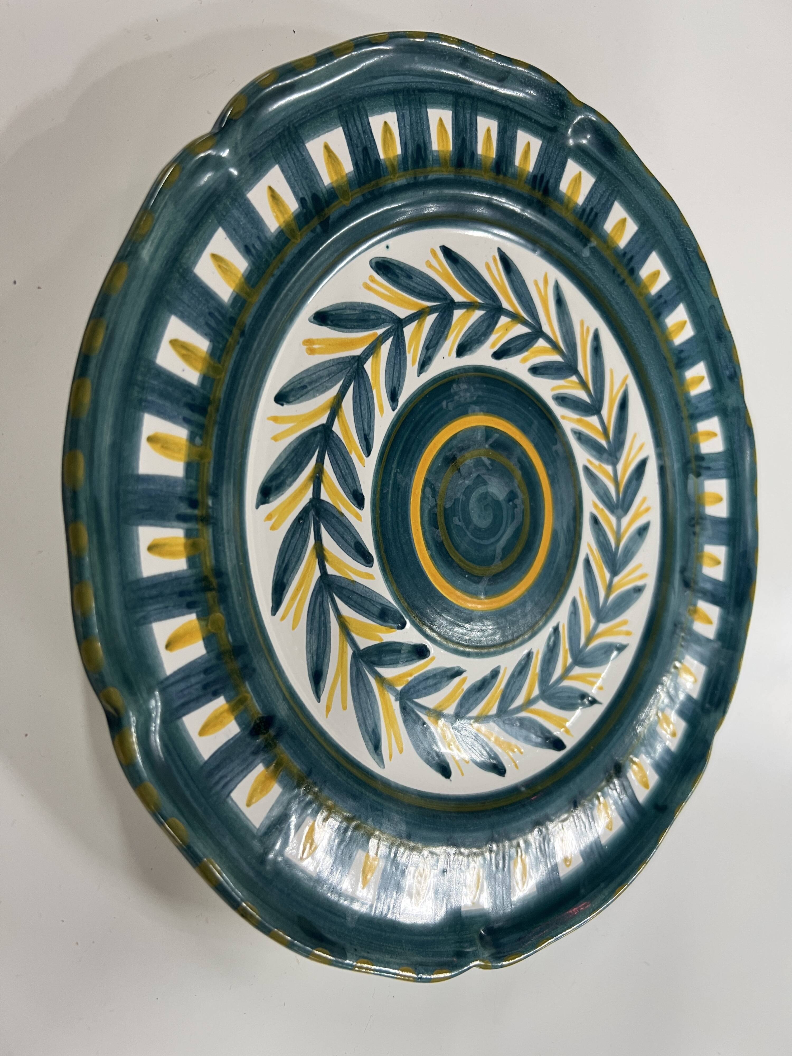 Painted and enamelled ceramic plate