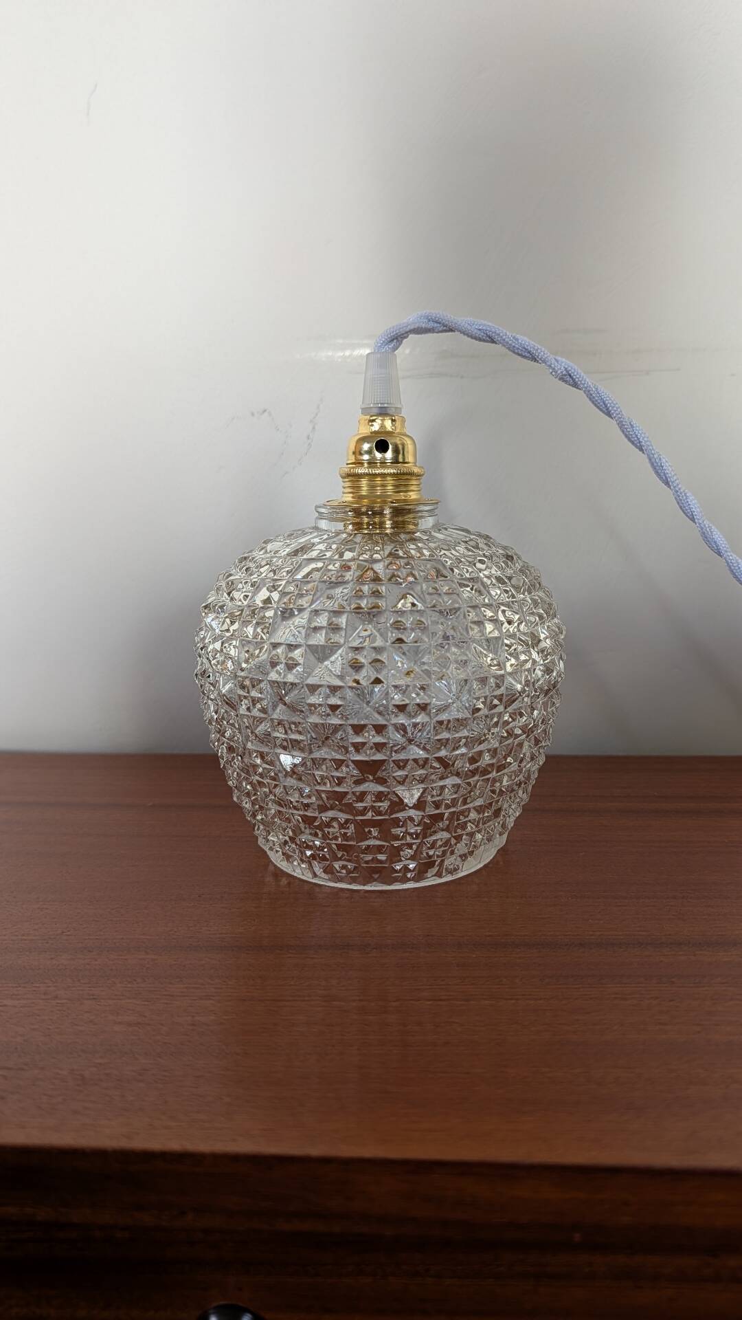 Facet-cut pressed glass pendant