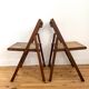 Two folding chairs wood and cannage