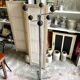 Space Age coat rack with 8 hooks in chrome-plated metal and brown bakelite