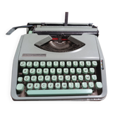 Hermès Baby lime green typewriter with suitcase