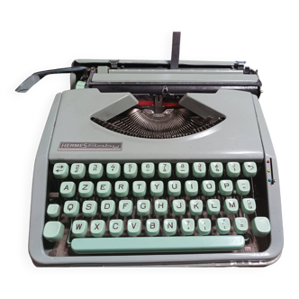Machine à écrire Hermès Baby  vert tilleul avec sa valise