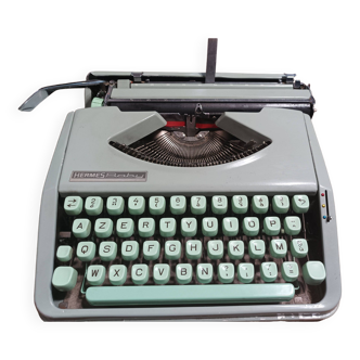 Hermès Baby lime green typewriter with suitcase