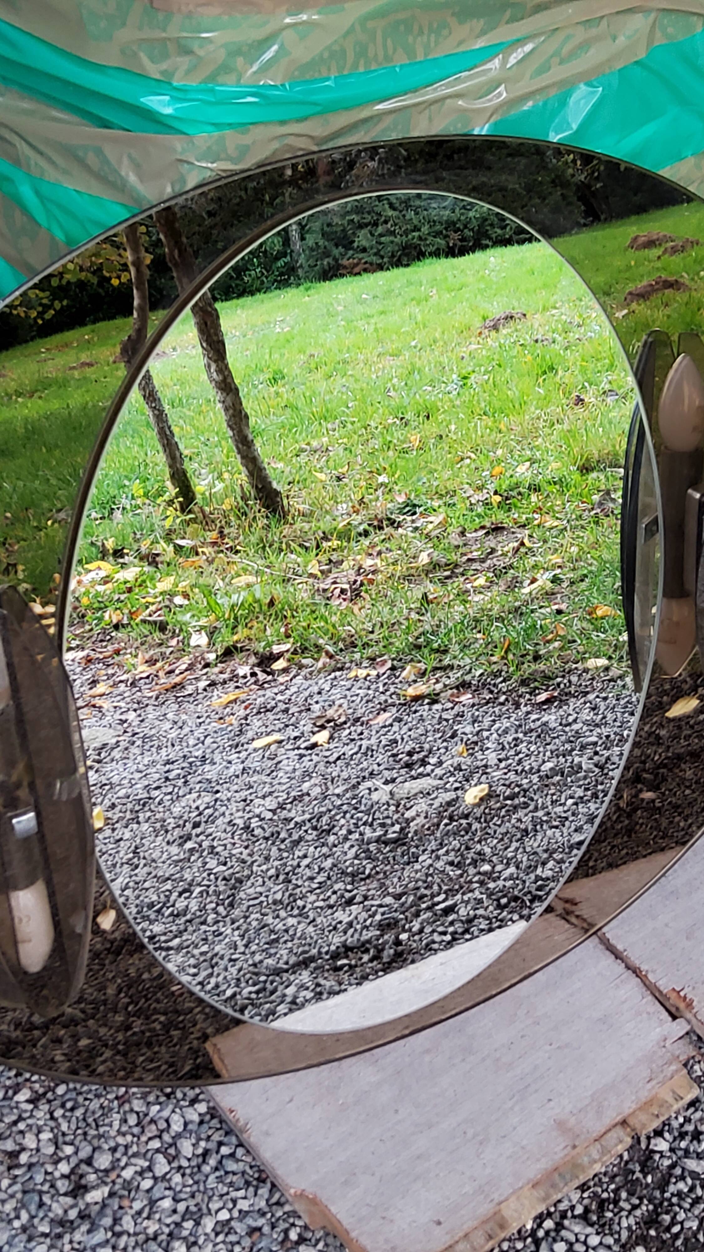 Oval mirror with 2 double tain sconces by Antonio Lupi from the 80s, 69x55 cm