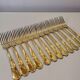 12 Table Forks in gold metal