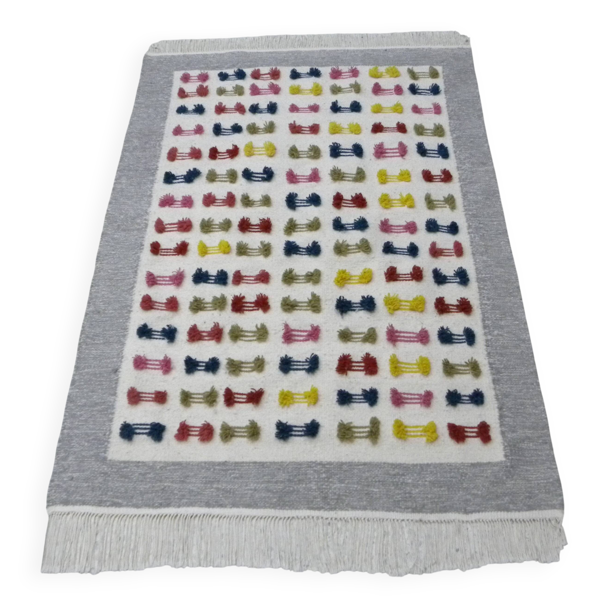 Handwoven Modern Boho Wool Rug with Colourful Patterns and Pompoms