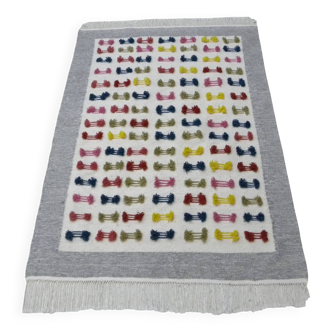 Handwoven Modern Boho Wool Rug with Colourful Patterns and Pompoms