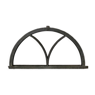 Old arched anthracite grey window