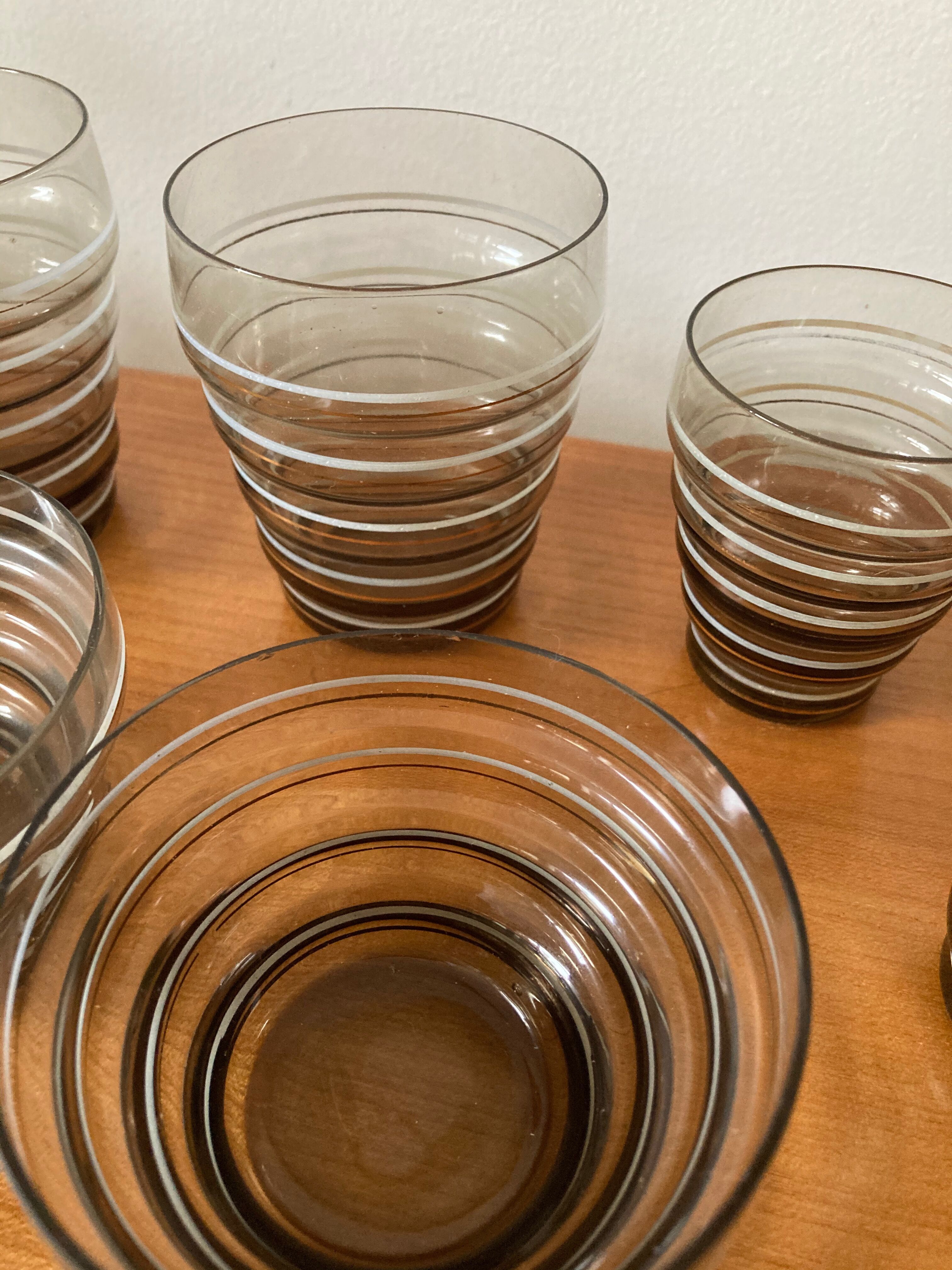 Service of glasses, cups, decanters of the 50s in smoked glass