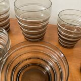 Service of glasses, cups, decanters of the 50s in smoked glass