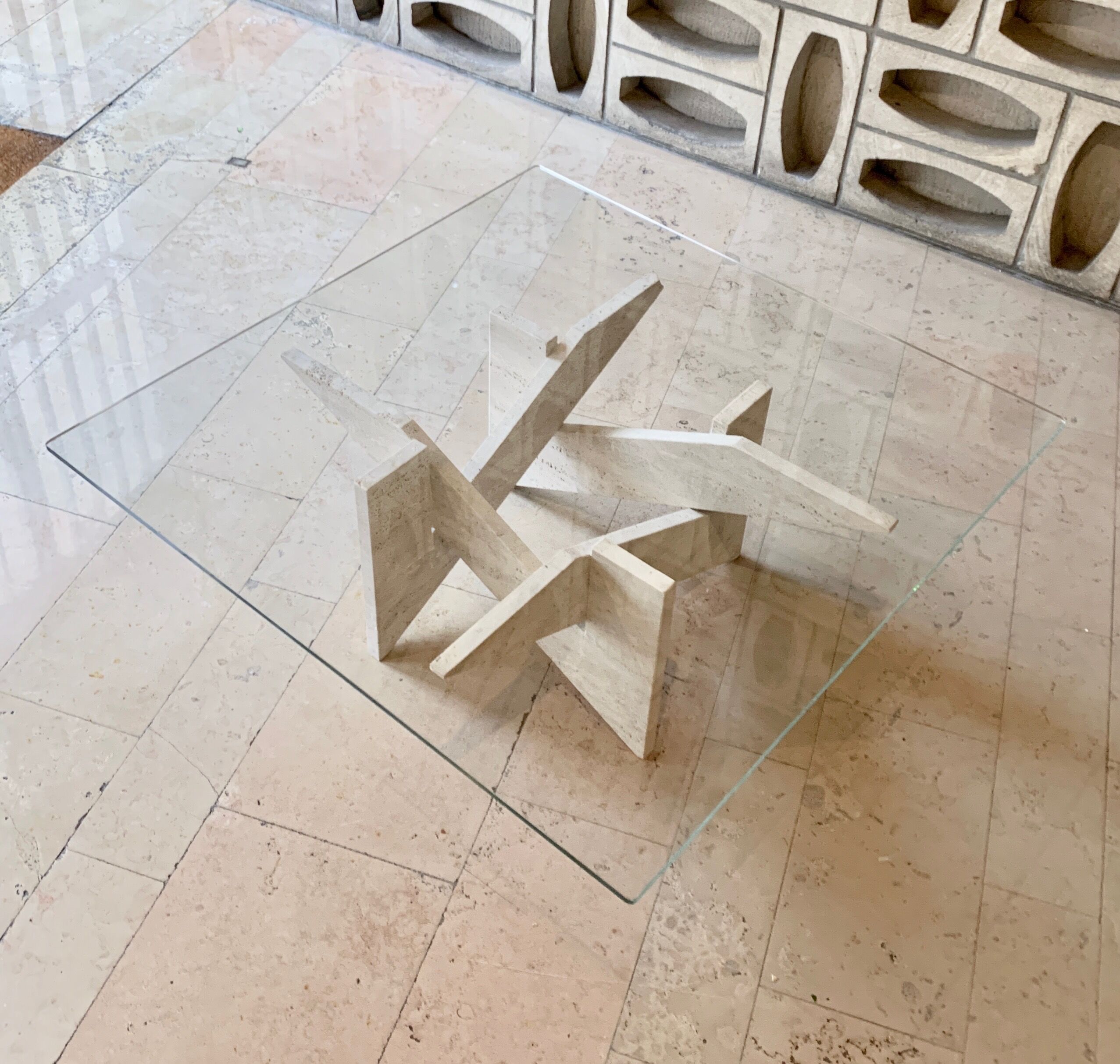 Travertine sculptural coffee table with square top