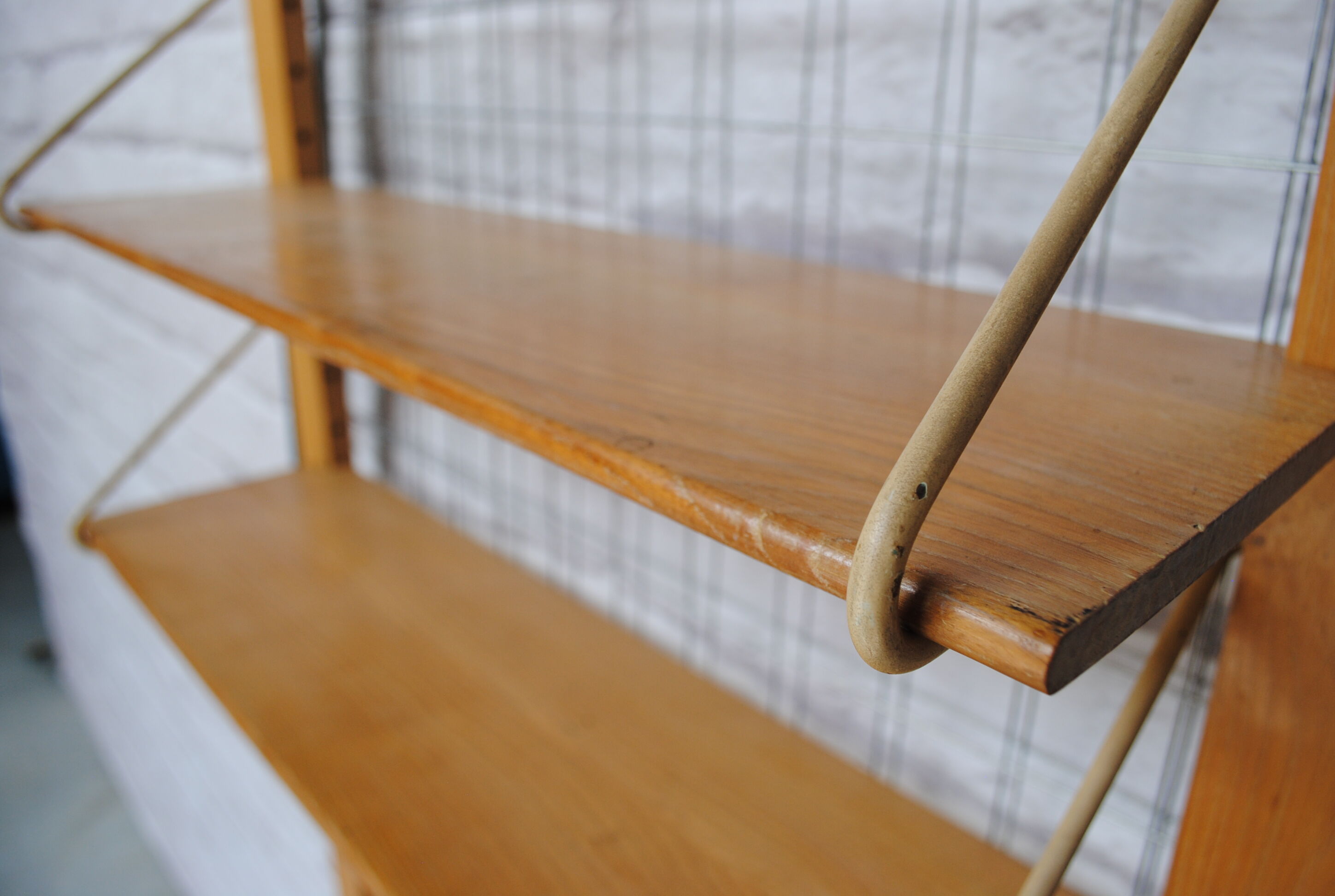Wooden and metal wall shelf