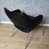 Armchair with leather and chrome armrests