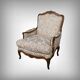 Queen's bergère in carved beech, Louis XV period – mid 18th century