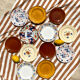 Set of 12 mismatched antique plates