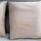 Set of three old hand-embroidered wool cushions
