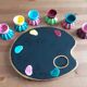 6 vintage cockroaches and their pallet-shaped tray