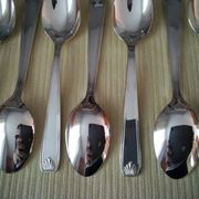 Set of 12 silver-plated coffee spoons in "shell" design.
