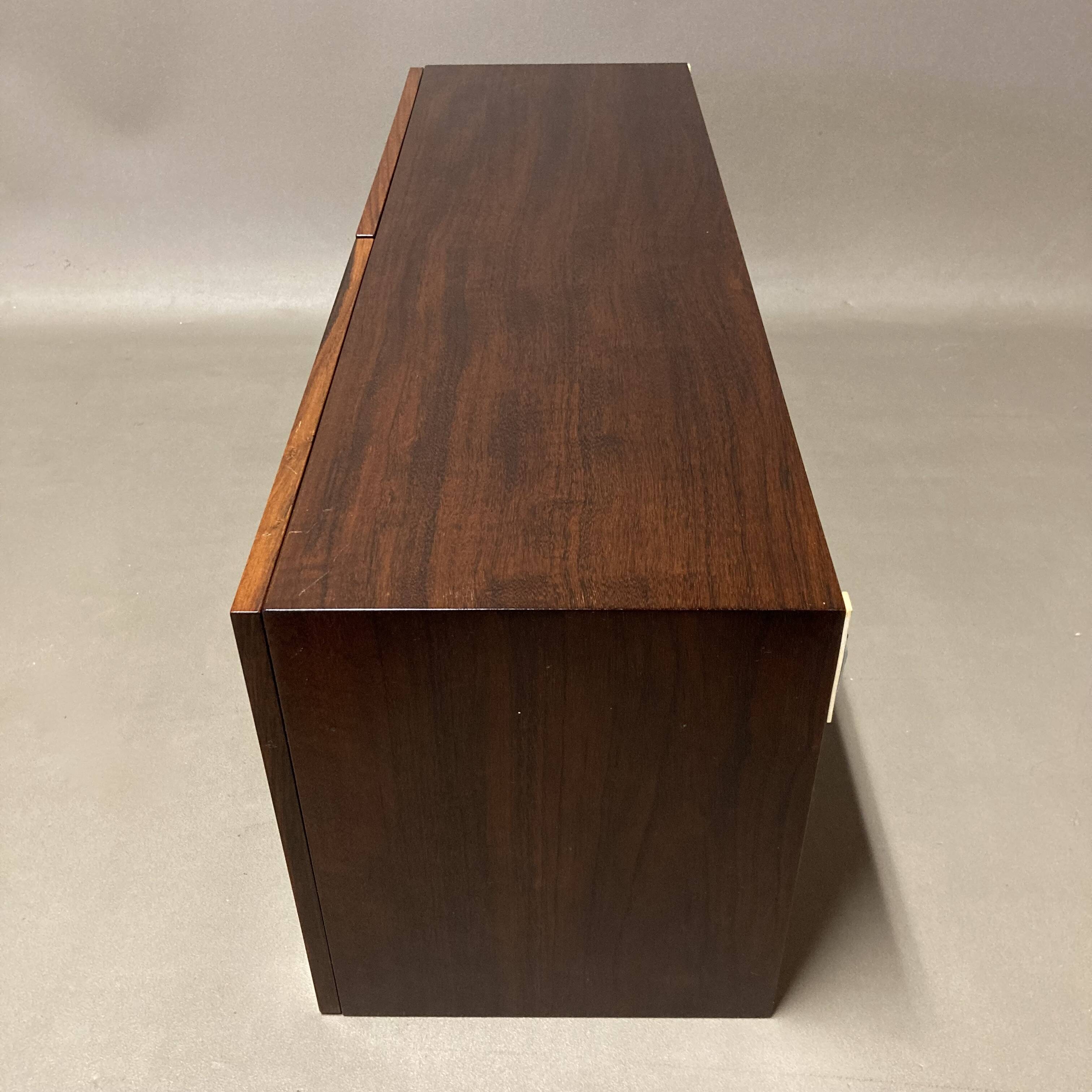 Scandinavian design rosewood hanging storage.