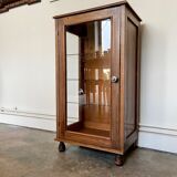 Dark wood display case and transparent glass