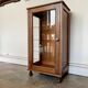 Dark wood display case and transparent glass