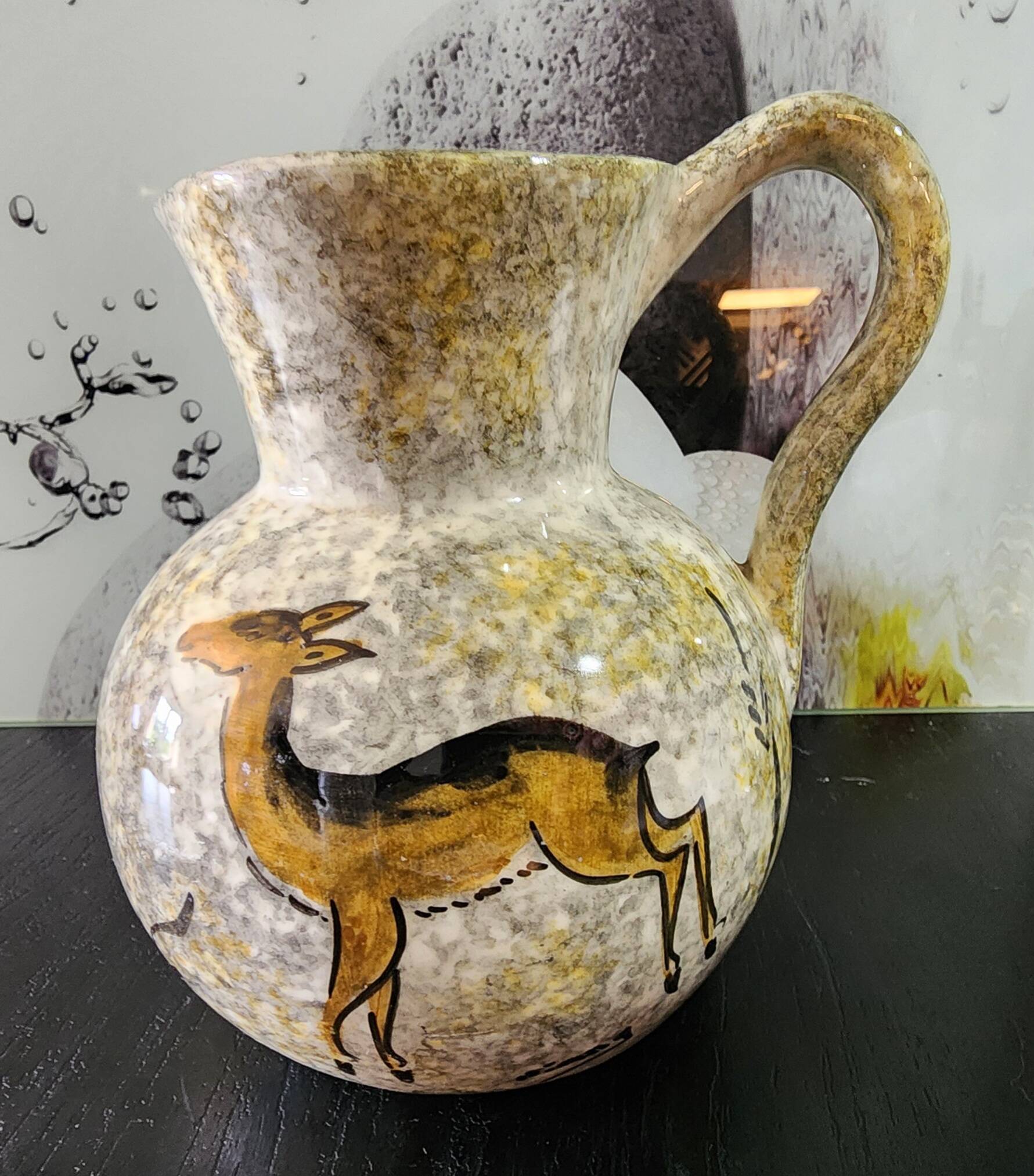 set of jug and ceramic cup handmade decorated with gazelle and deer