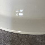 Round hollow earthenware dish