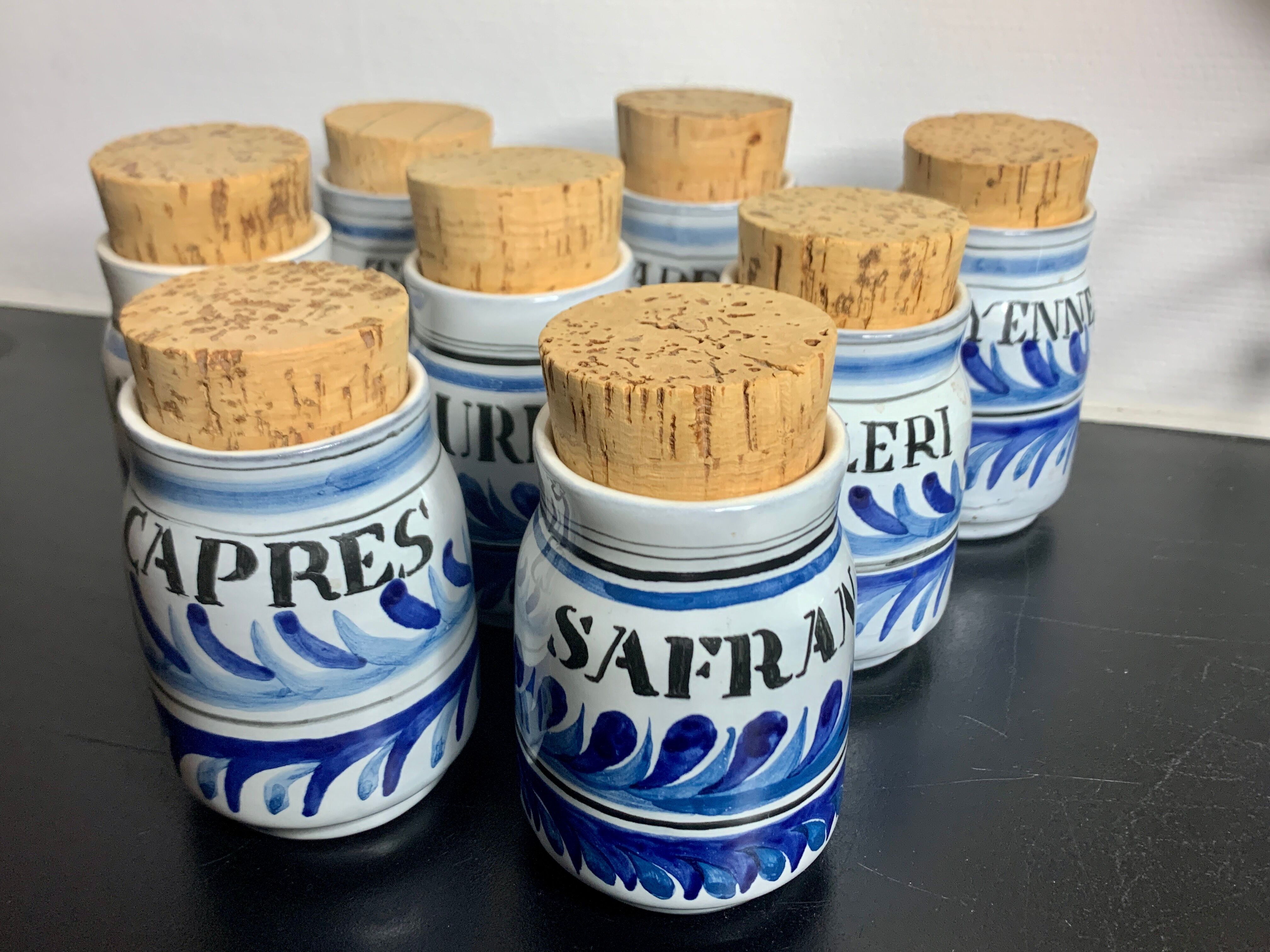 Set of 8 ceramic spice pots by Roger Capron
