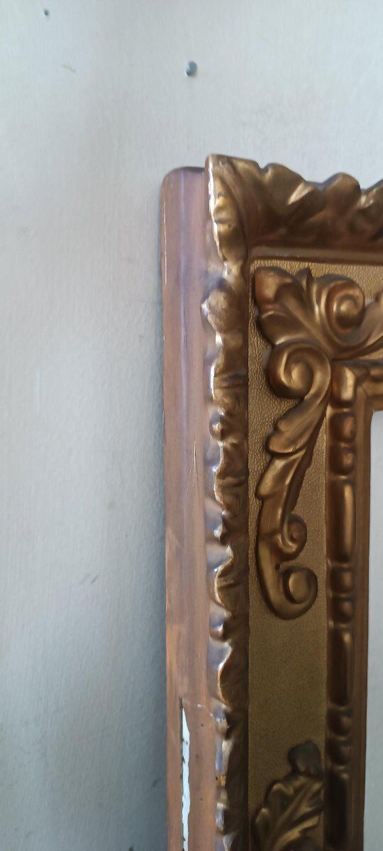 Miroir ancien en bois doré