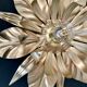 Vintage wall lamp golden leaves