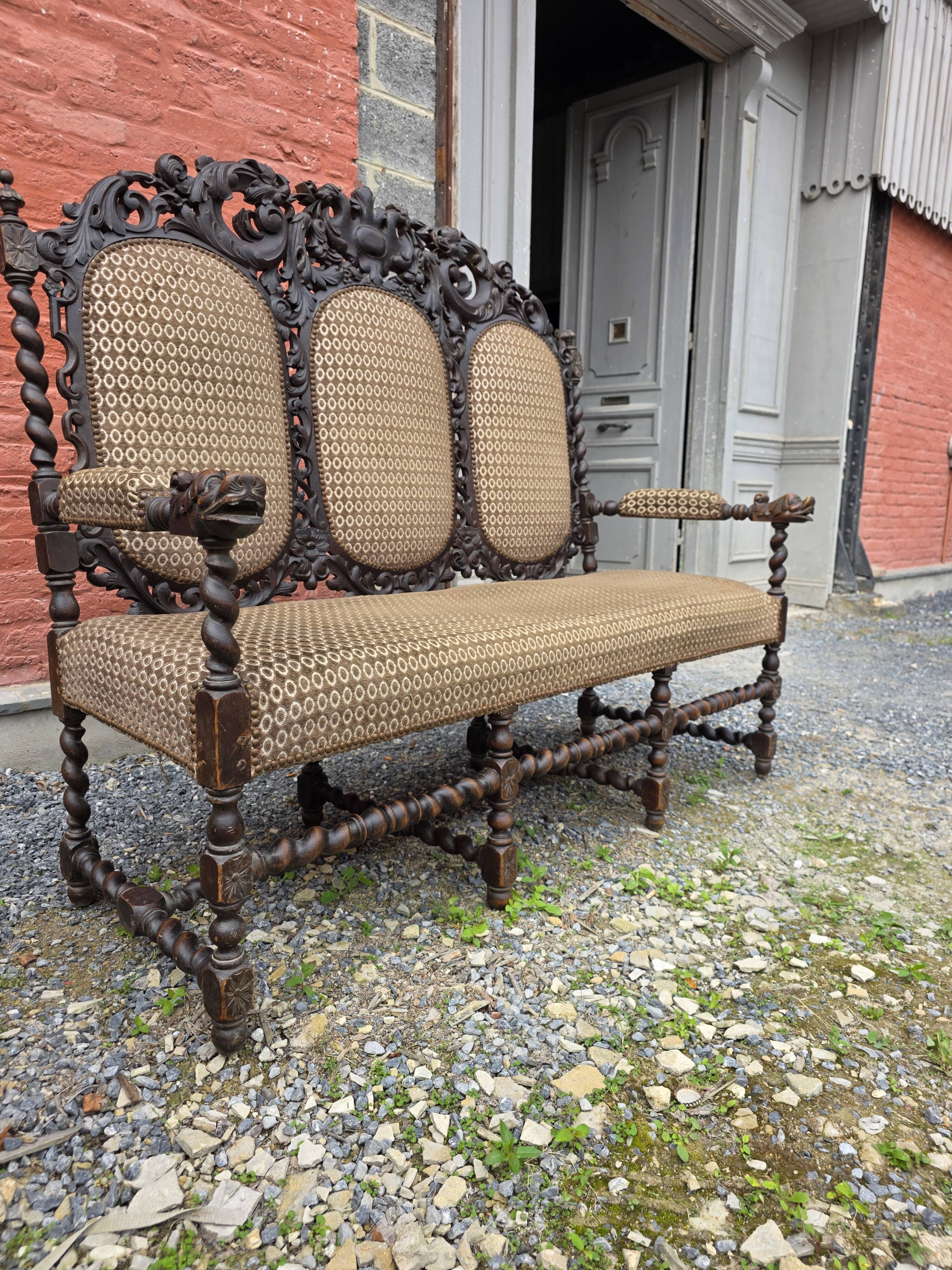 Three-seater armchair in Louis XIII style made of oak from the 19th century.