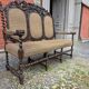 Three-seater armchair in Louis XIII style made of oak from the 19th century.