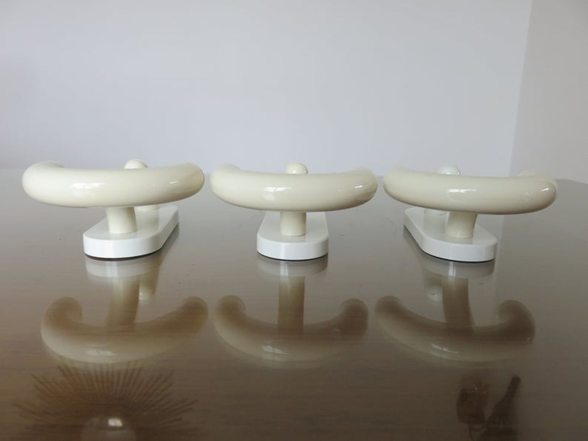 Luigi Caramella's series of 3 patères for " Con & Con " Itay era Memphis 80s