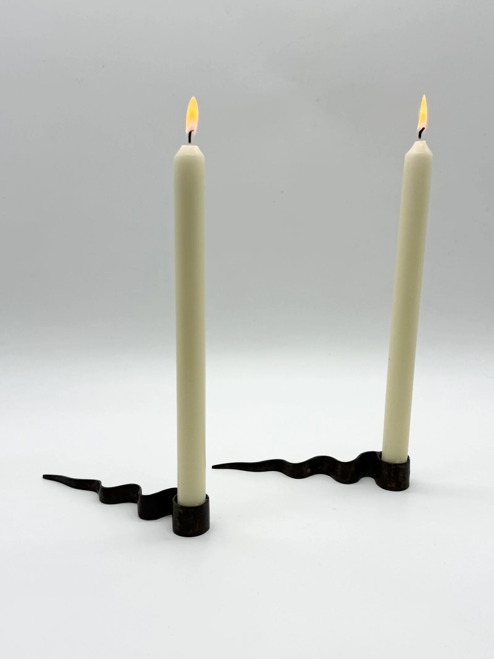 Pair of "Serpentine" candlesticks, modernist, 1970s