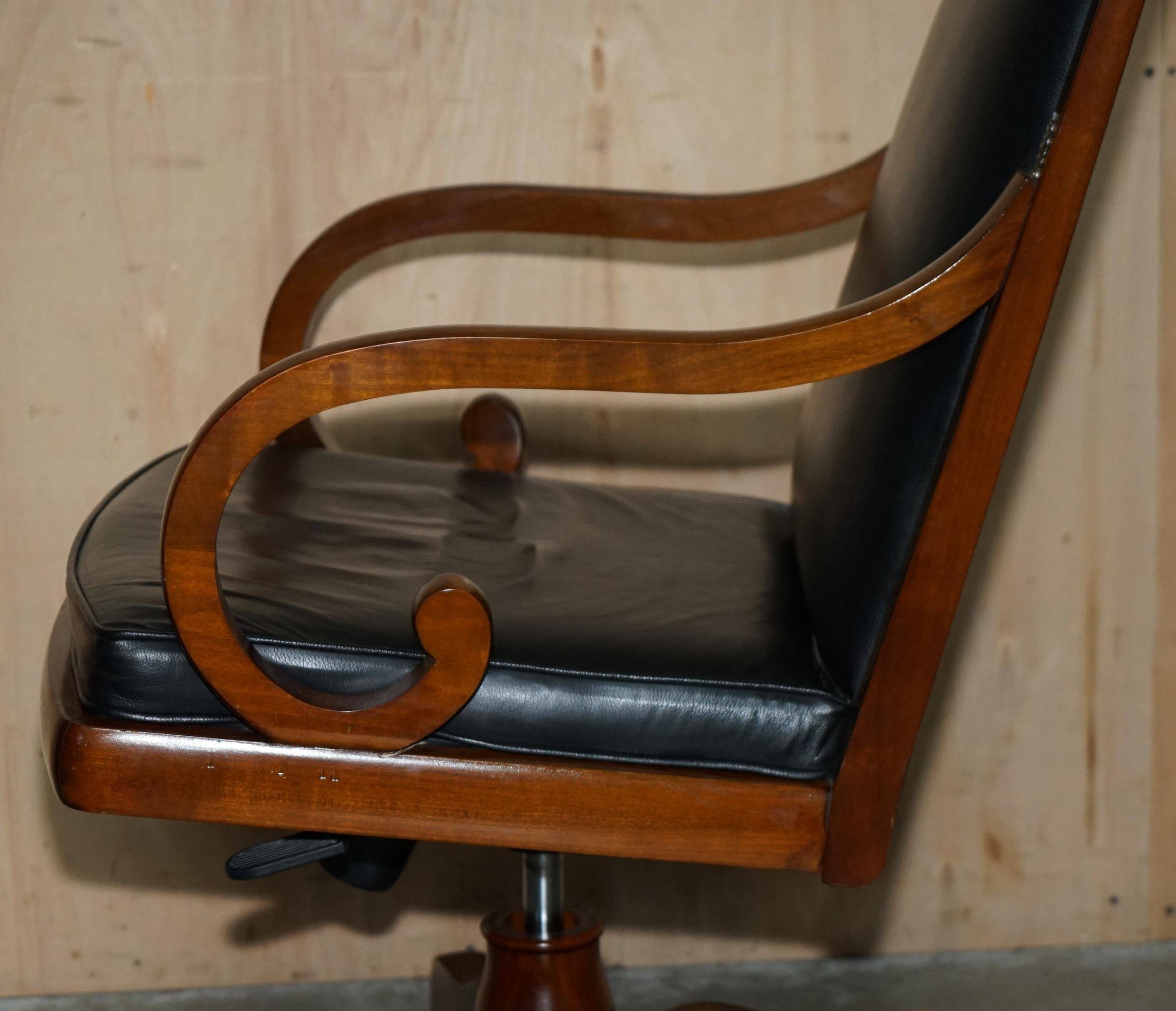Captain's armchair in leather and cherry wood Grange Paris