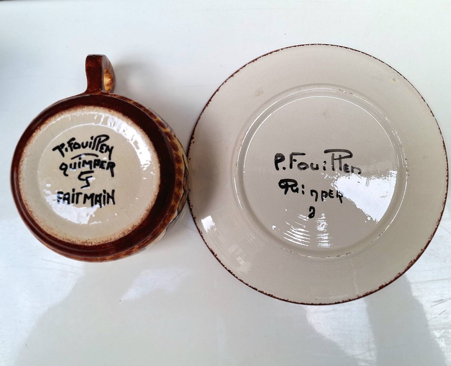 Part of a Quimper ceramic dinner service signed Paul Fouillen