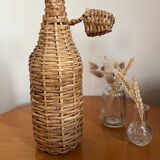 Bouteille en verre et rotin vintage