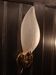 Murano glass wall light in the shape of a leaf.