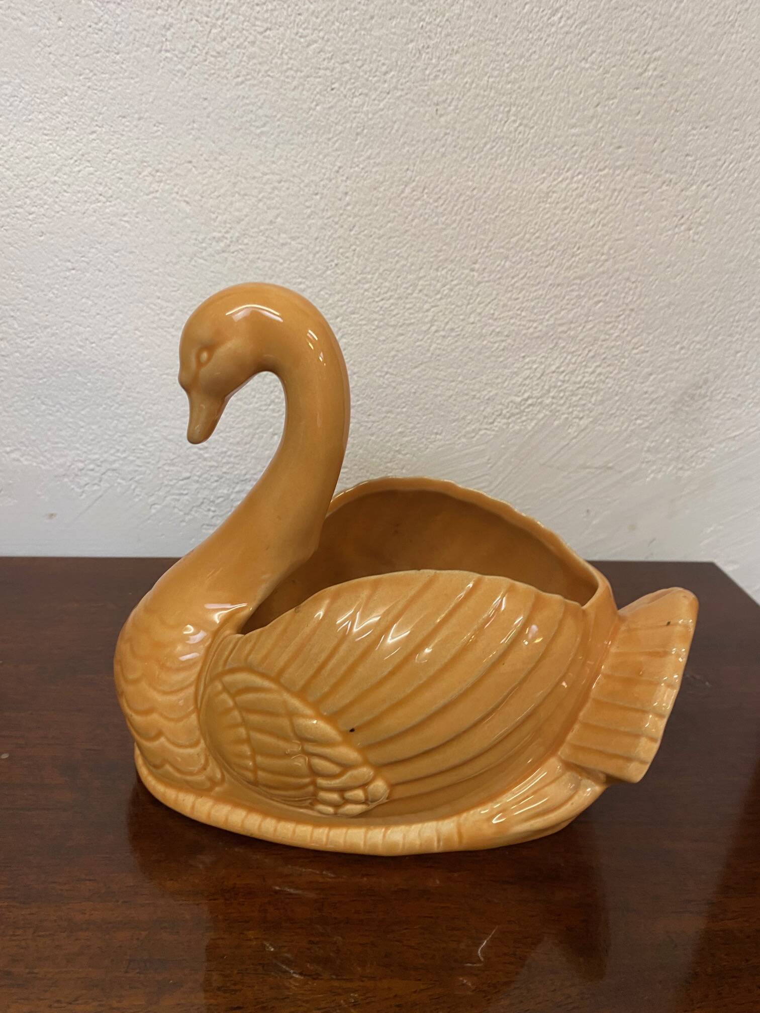 Swan shaped planter in 70s earthenware apricot orange color
