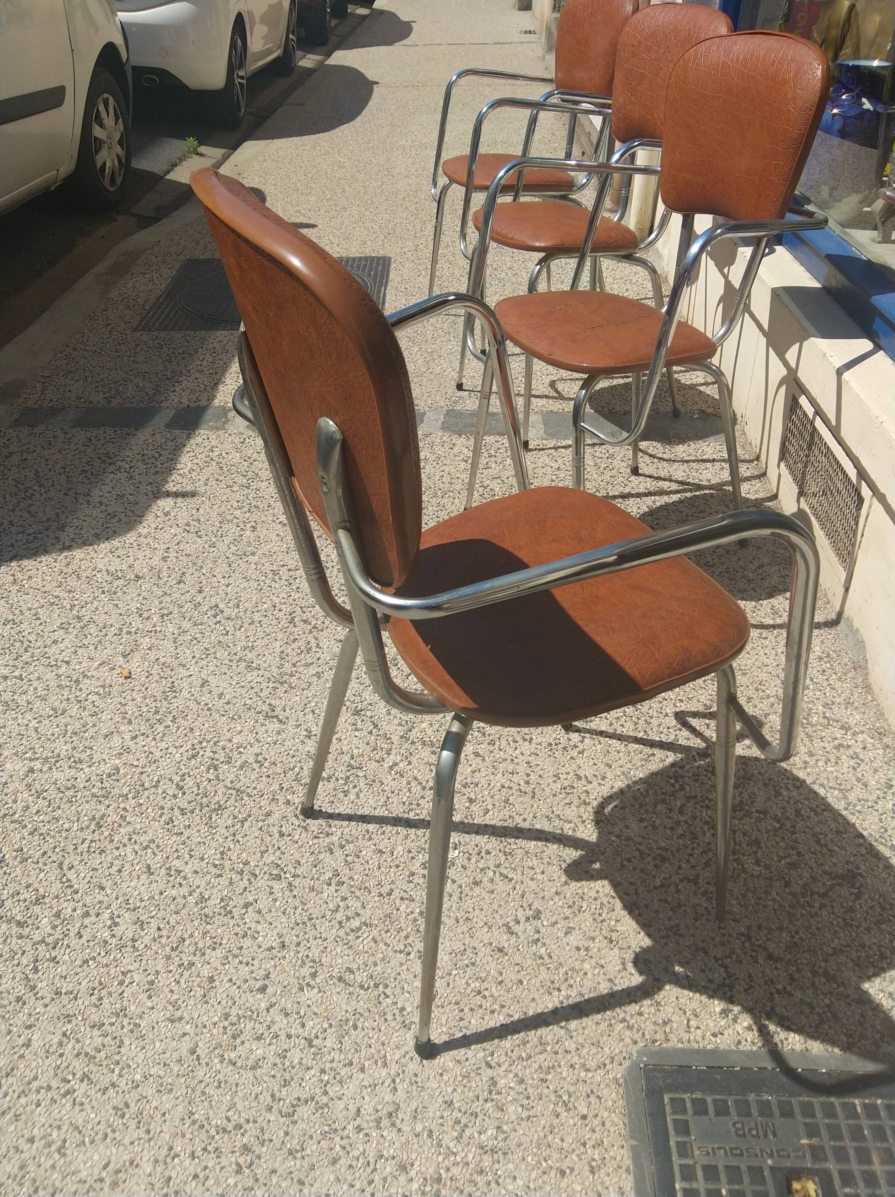 Set of 4 armchairs in chromed metal and brown imitation leather, circa 1960
