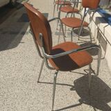 Set of 4 armchairs in chromed metal and brown imitation leather, circa 1960