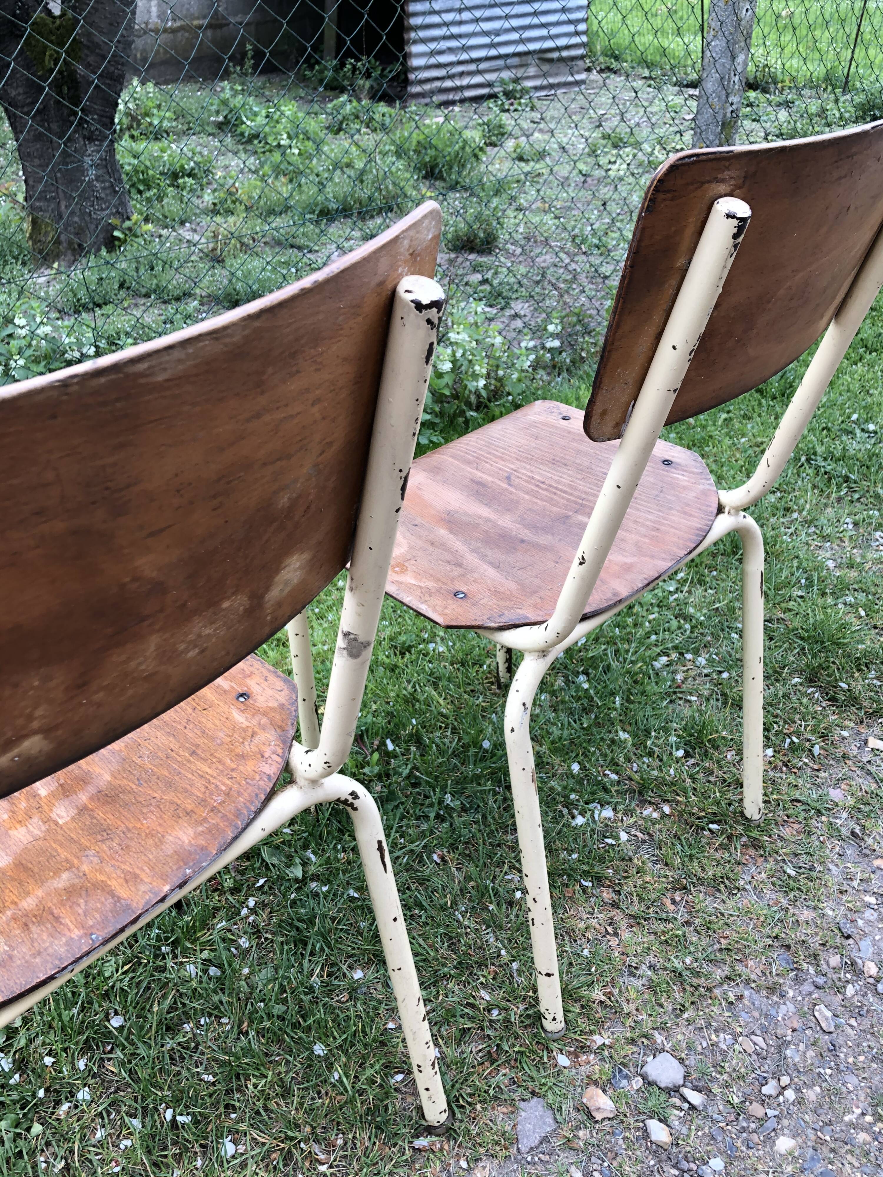 Three vintage school chairs