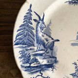 "Rustic" iron earth plate with goats